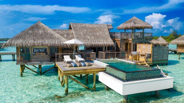 Gili Lankanfushi Maldives luxury overwater resort near Malé, featuring sustainable overwater villas with private decks, direct lagoon access, and the iconic Private Reserve, the world’s largest overwater villa in the Maldives.