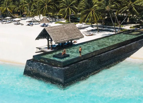 One&Only Reethi Rah Maldives luxury private island resort in the North Malé Atoll featuring beachfront and overwater villas with oceanfront infinity pools, expansive beaches, and ultra-luxury island living.