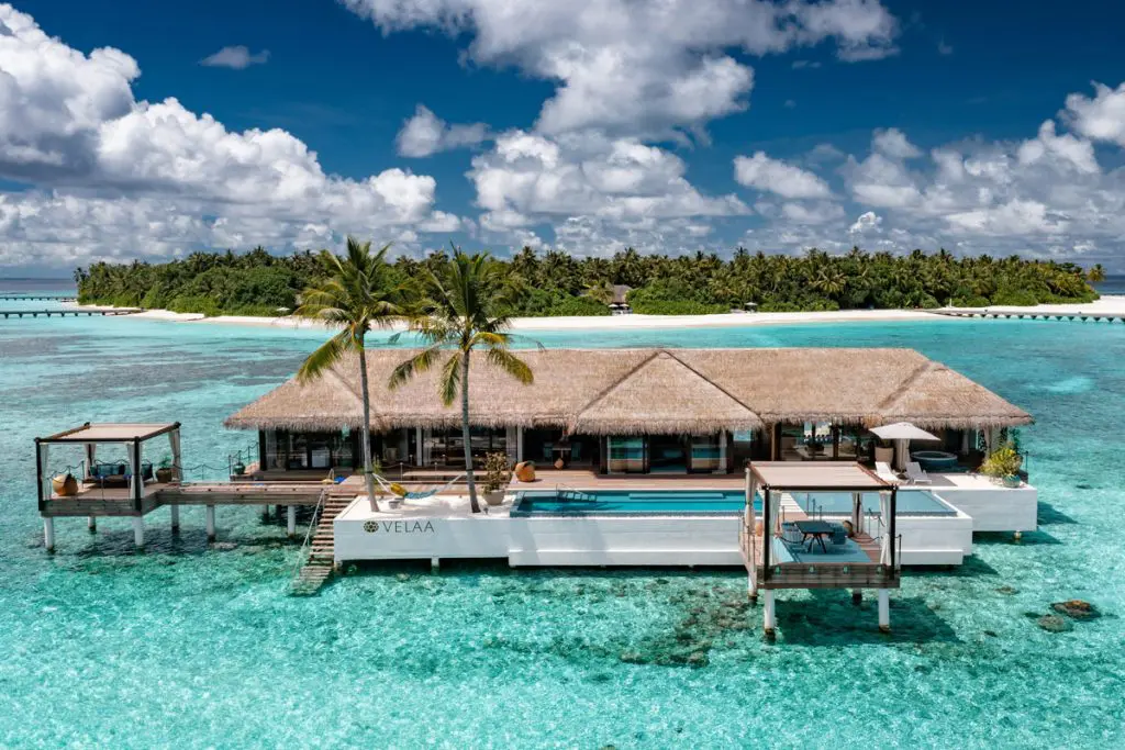 Velaa Private Island Maldives luxury resort in the Noonu Atoll featuring low-density private villas with infinity pools, overwater golf facilities, dedicated butler service, and ultra-exclusive private island living in the Maldives.