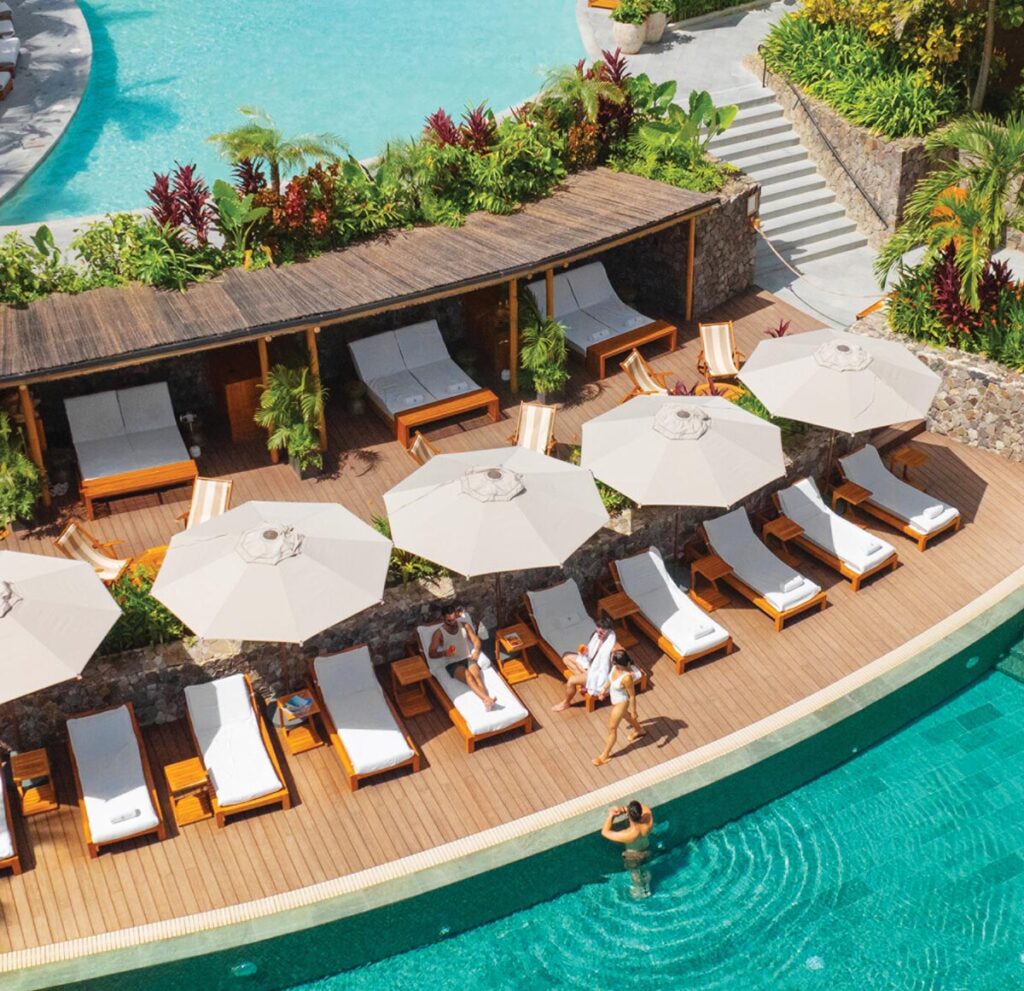 The Four Seasons Resort Peninsula Papagayo in Costa Rica, featuring private infinity pools, five-star service, beachfront amenities, and private butler service.