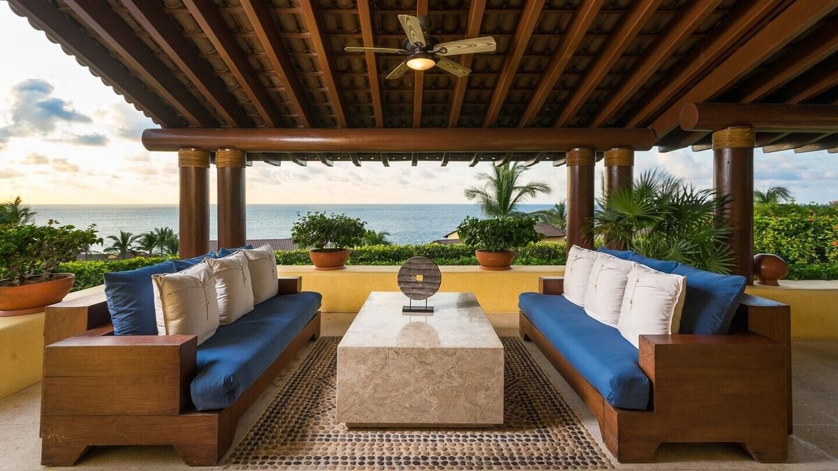 Four Seasons Private Residences Punta Mita luxury villa terrace with modern design, private lounge space, and panoramic Pacific Ocean views.