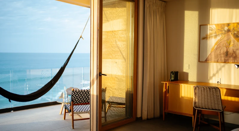 Hotel Basalto Punta Mita boutique hotel with oceanfront luxury suites, private plunge pools, and modern design above Litibú Beach in Riviera Nayarit.