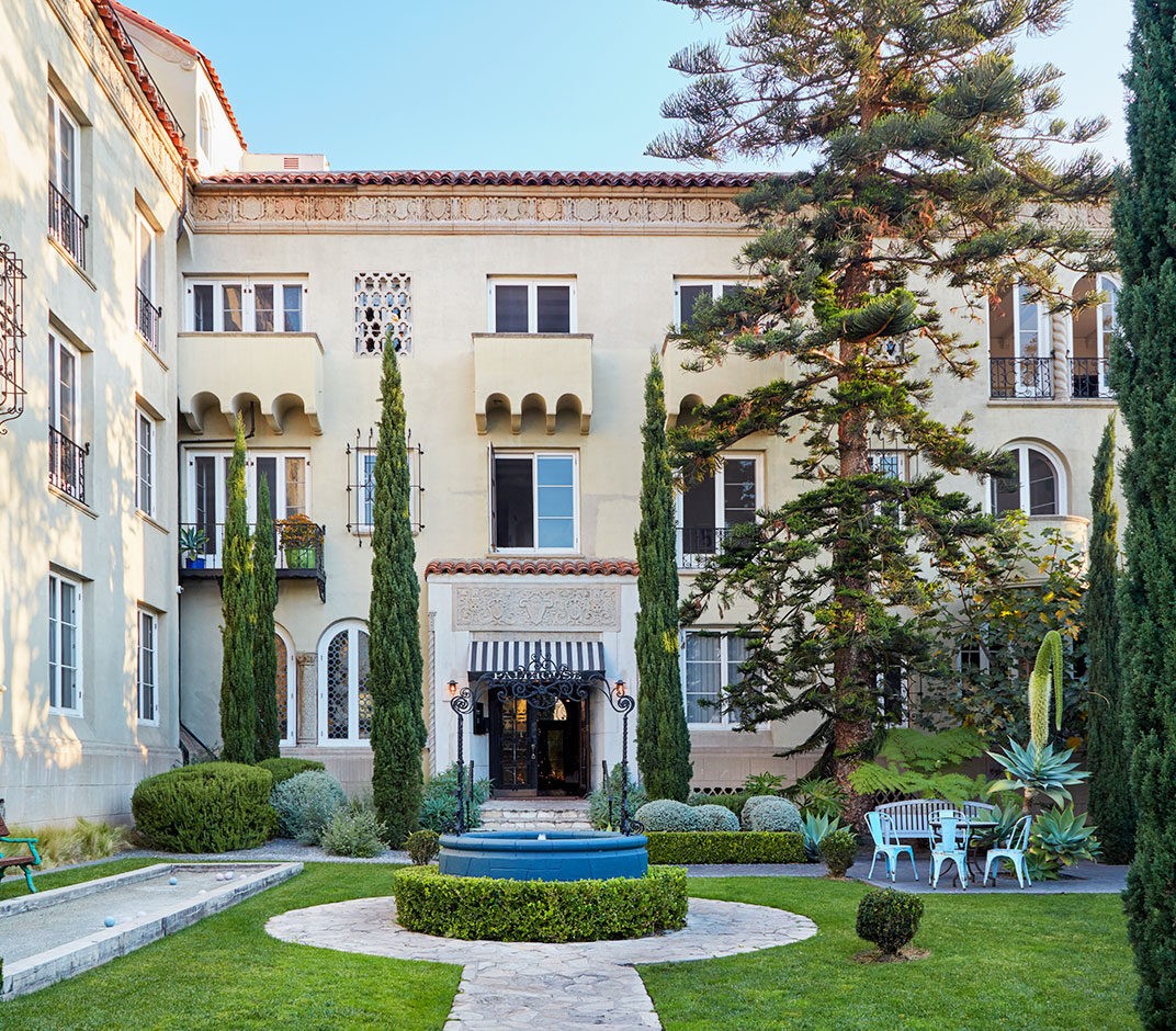 LA boutique hotel with garden-view suites at Palihouse Santa Monica featuring classic architecture and refined residential-style luxury.