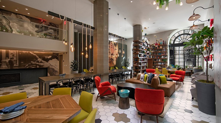 LA boutique hotel with a rooftop bar at The Wayfarer Downtown LA featuring skyline views and modern urban design.