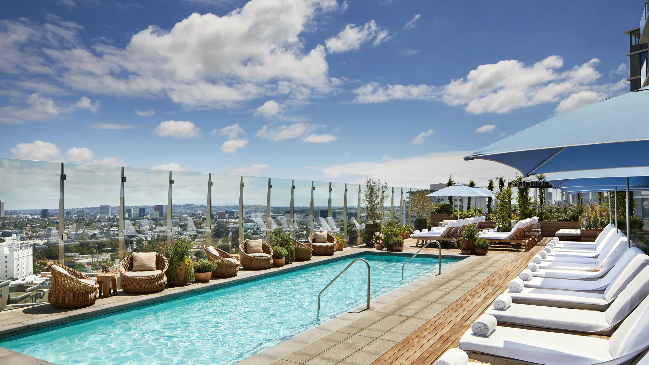 Rooftop pool at 1 Hotel West Hollywood overlooking the Los Angeles skyline, featuring luxurious five-star suites, rooftop daybeds, panoramic views, and sustainable luxury design on the Sunset Strip. West Hollywood Boutique Hotels | Boutique Hotels Los Angeles | Boutique Hotels West Hollywood | West Hollywood Hotels | Best WeHo Hotels | Best Hotels in Los Angeles | Hotels in West Hollywood | Hotel Boutique LA | Luxury Hotels in Los Angeles | Where to Stay in Los Angeles | 5 Star Hotels Los Angeles | Boutique Hotel Rooms in West Los Angeles | Cool Hotels West Hollywood | Best Hotels in West Hollywood | Jetset Select