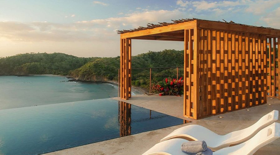 Casa Chameleon at Las Catalinas, an adults-only boutique luxury resort in Costa Rica featuring private infinity pool villas and Pacific Ocean views.