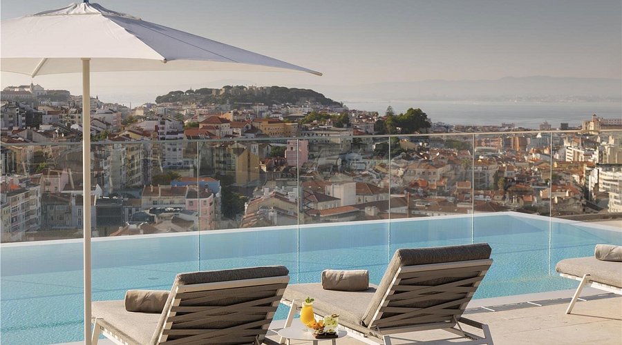 Luxury rooftop infinity pool at EPIC SANA Marquês Hotel Lisbon with panoramic city and Tagus River views, modern five-star hotel near Marquês de Pombal and Eduardo VII Park, best rooftop pools Lisbon. Epic Sana | Epic Sana Marquês Hotel | Hotel Epic Sana Lisboa Portugal | Epic Sana Hotel Lisbon | Epic Sana Marques Hotel | Epic Sana Lisboa | Lisbon 5 Star Hotels | Luxury hotels Lisbon | Best Hotels in Lisbon | Where to stay in Lisbon